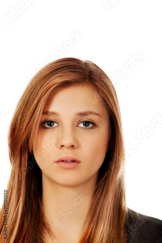 Portrait of teenage woman with serious face