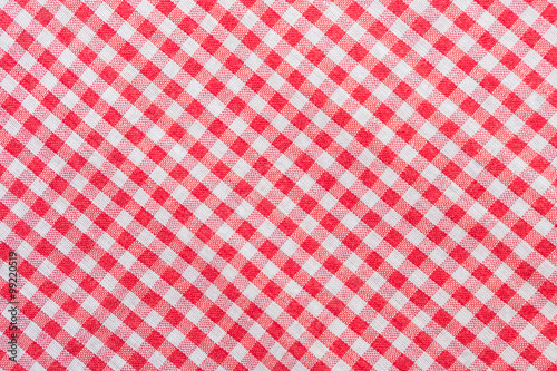 Red classic checkered tablecloth texture, background with copy s