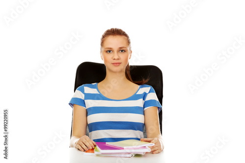 Teenage woman learning at the desk