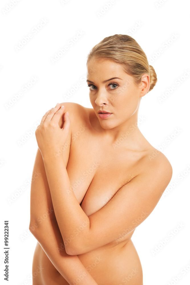 Portrait of nude woman covering her breast Portrait of nude woman covering her breast