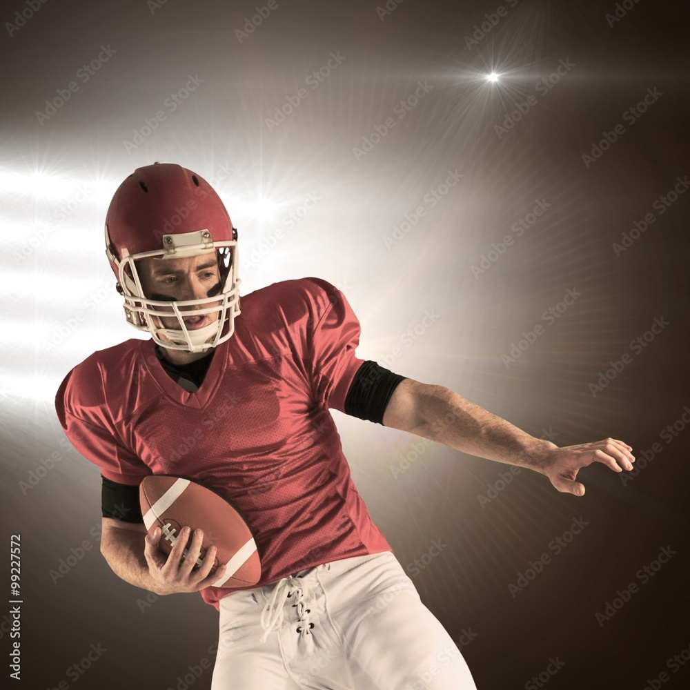 Composite image of american football player protecting football Composite image of american football player protecting football