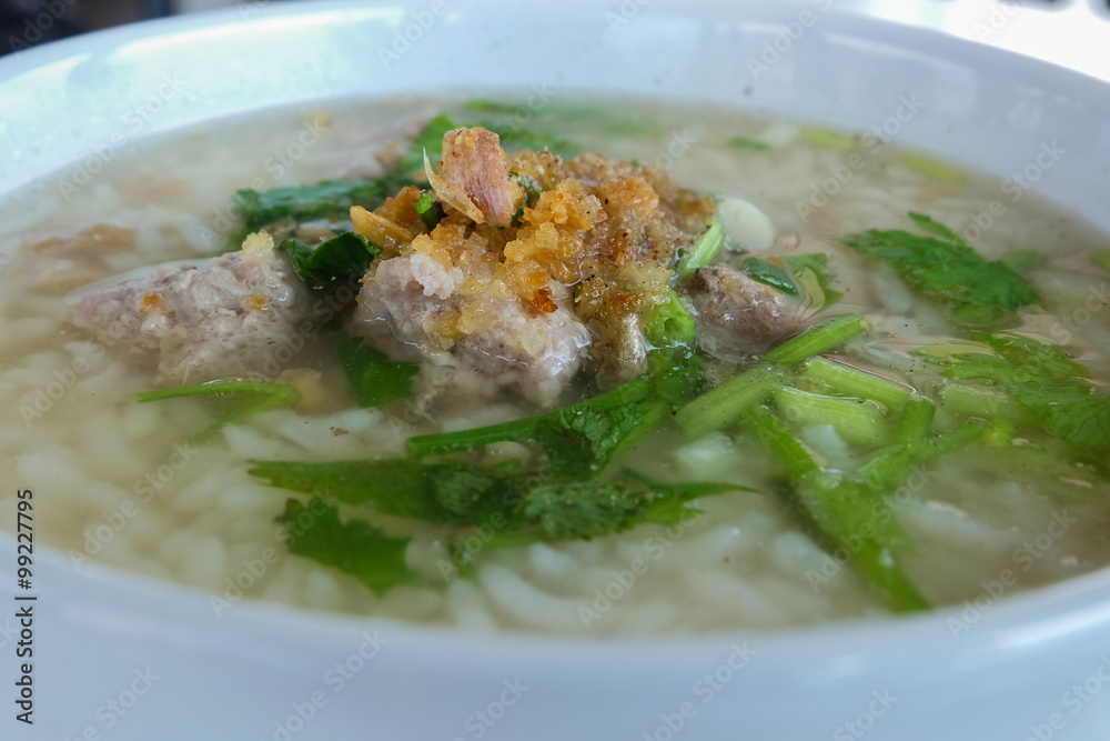close up of Rice gruel, Thai chinese asian rice porridge with pork