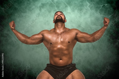 Composite image of muscular man flexing for camera