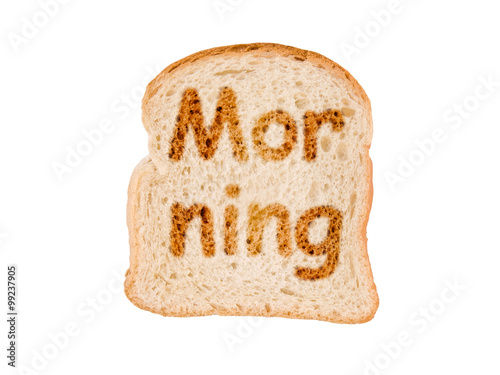 Word  morning written on a toasted slice of bread