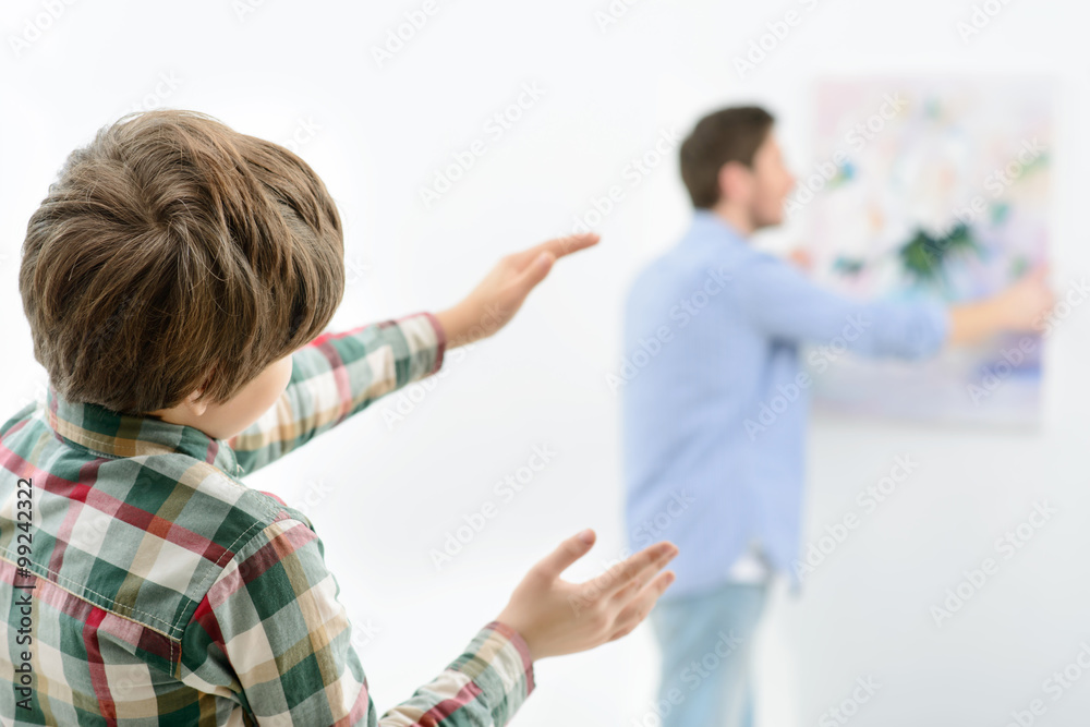 Father and son making renovation at home 
