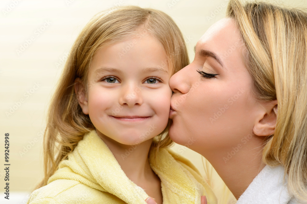 Mother and daughter expressing love 