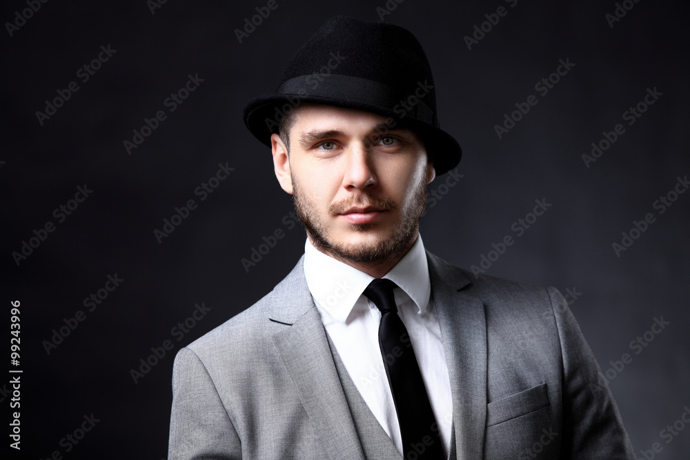 Portrait of handsome stylish man in elegant suit Portrait of handsome stylish man in elegant suit