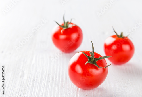 Fresh cherry tomatoes on a ...