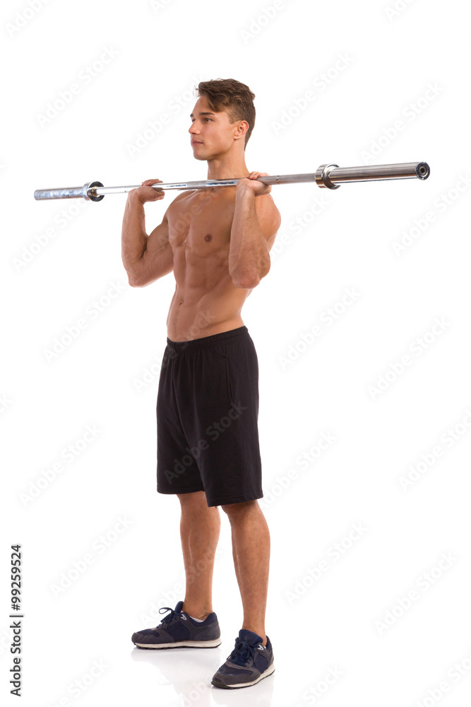 Fit Man Holding Barbell On His Shoulders Fit Man Holding Barbell On His Shoulders