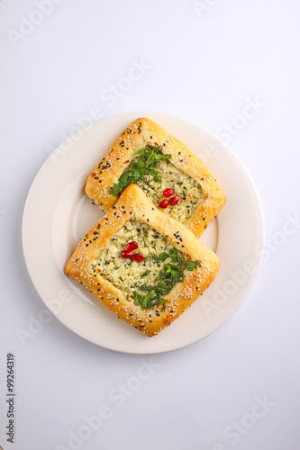 " khachapuri " cake of puff pastry with cheese and pomegranate