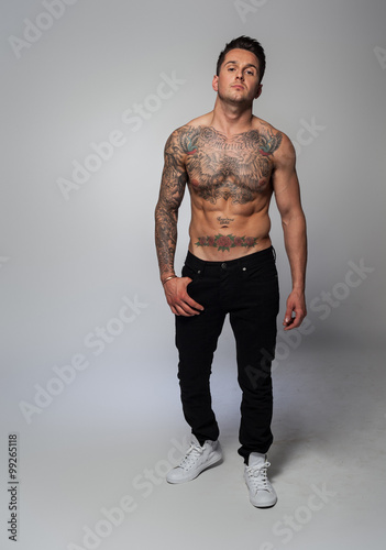 shirtless tattoed man