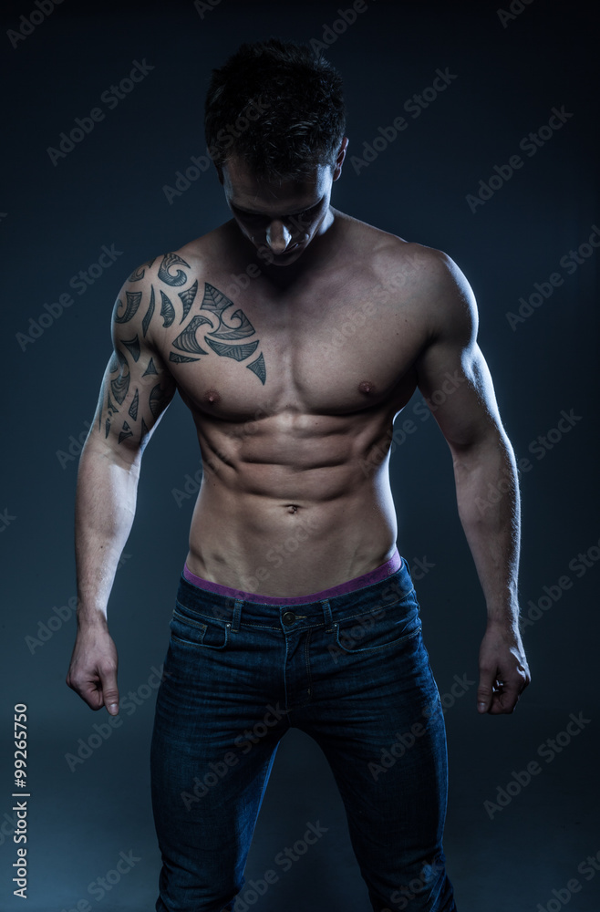 male fitness model with the tattoo