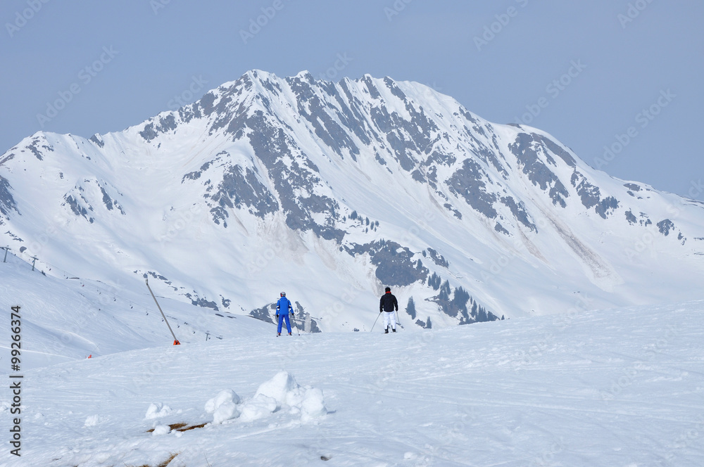 Skiers skiing in the Alps