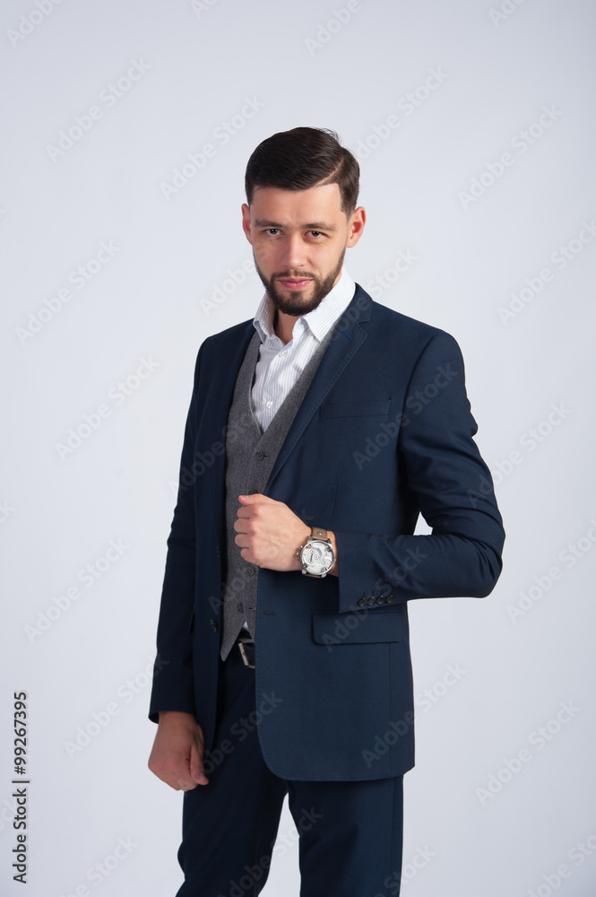 The young businessman in a blue jacket The young businessman in a blue jacket