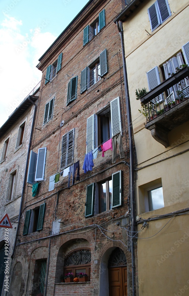 Facades of buildings in Siena, Italy