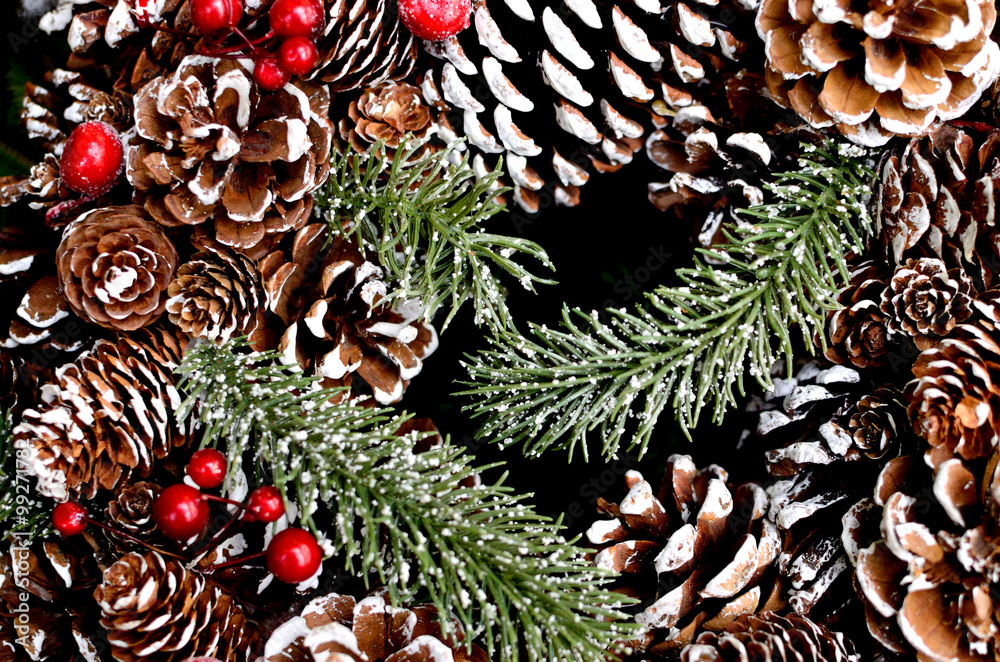 Naklejka premium Christmas background Christmas cones and pine branches