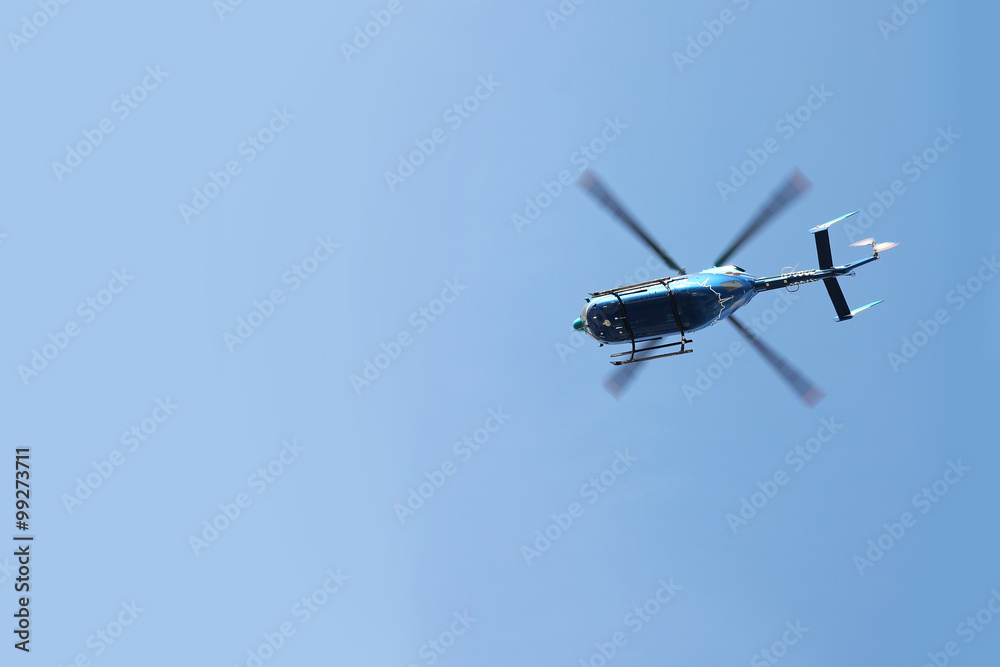 Emergency Rescue Transport Helicopter Flying in Blue Sky Emergency Rescue Transport Helicopter Flying in Blue Sky