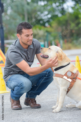 Obraz na płótnie Man training a guide dog
