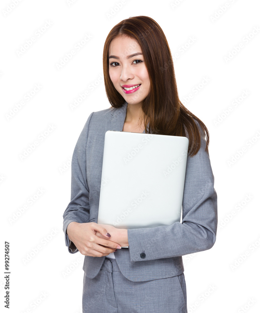 Asian Businesswoman hold with laptop computer Asian Businesswoman hold with laptop computer