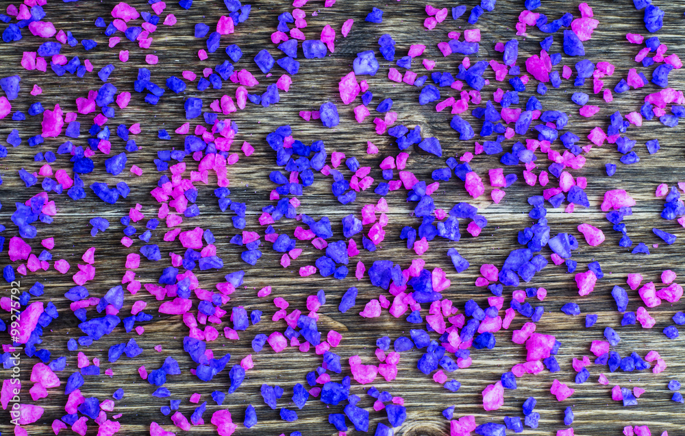 Fototapeta premium Sea salt abstract on wooden table. Spa background.