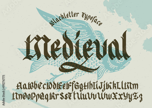 Gothic medieval typeface. Black-letter fracture font with flying fish illustration.