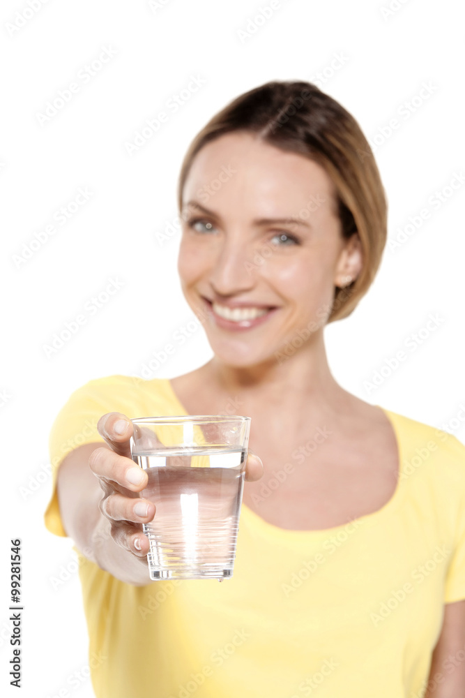 Portrait of a happy woman holding a glass of fresh water Portrait of a happy woman holding a glass of fresh water