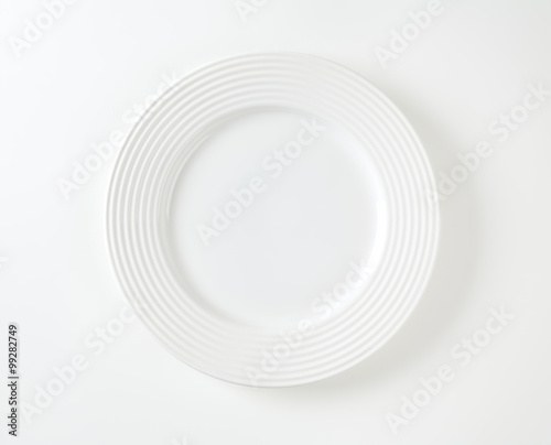 White porcelain plate with wide rim