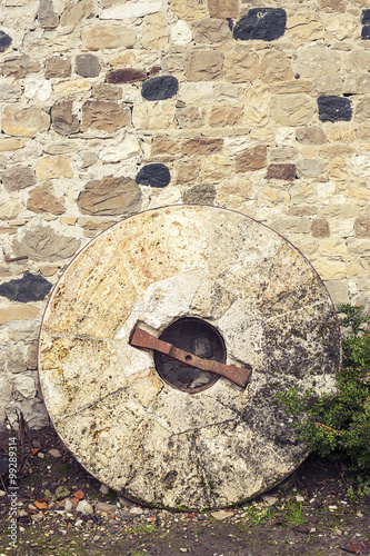 Old millstone for watermill
