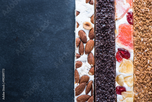 Nougat bars on dark background, copy space
