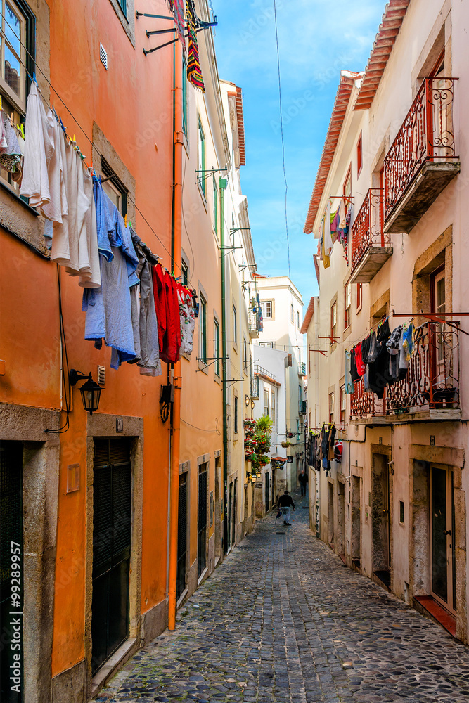 Typical building in Lisbon and drying clothes. Portugal.