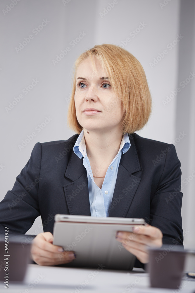 business woman with a tablet in the office