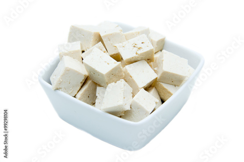 Cubes of tofu square bowl on a white background