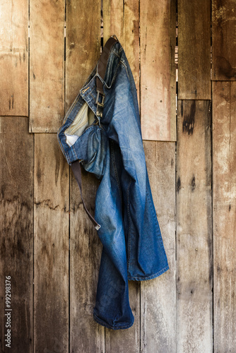 Vintage,Jeans hanging on the wall photo