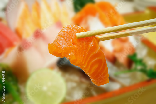 salmon sashimi with sashimi set background