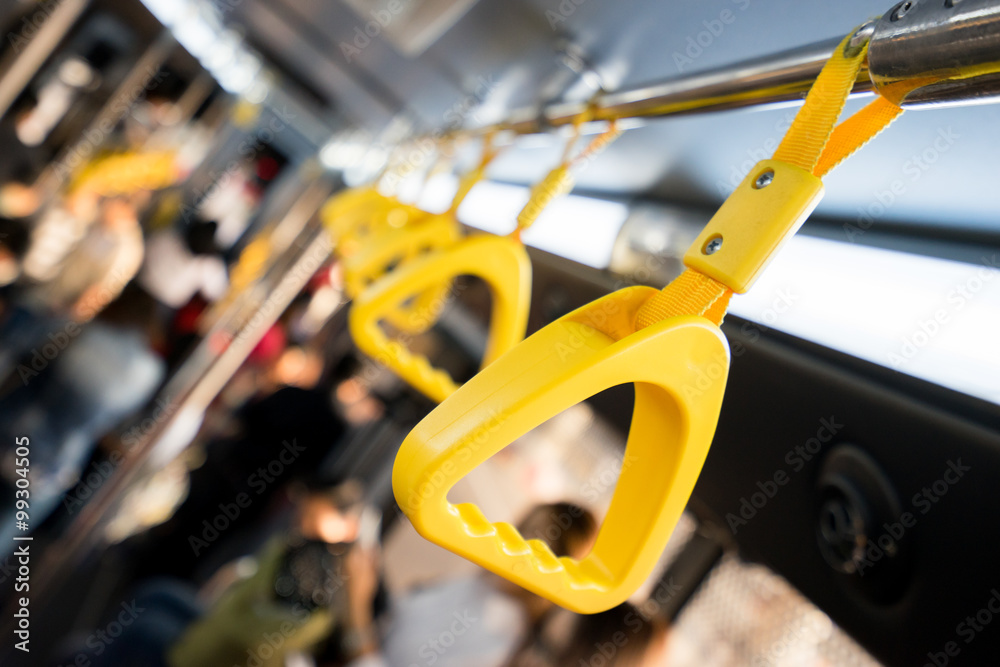 Handle on ceiling of bus,handle on a train