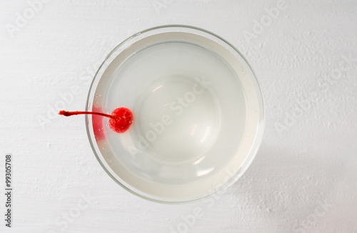Cocktail in margarita glass on the wooden background