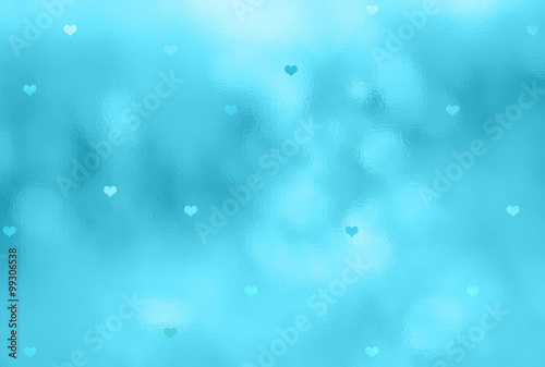 Lovely cyan blue color blurry glass textured window details with beautiful small Valentine's Day Heart symbols illustration background. Lovely Valentine Holidays greeting card copy space background.
