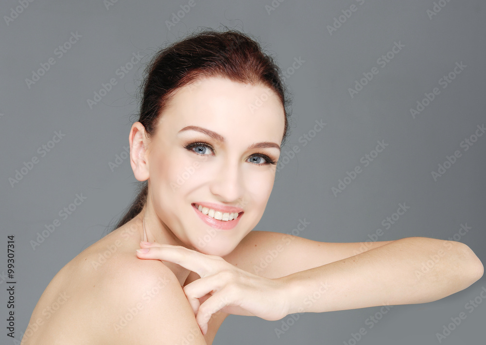 Portrait of pretty young sexy woman on gray background Portrait of pretty young sexy woman on gray background