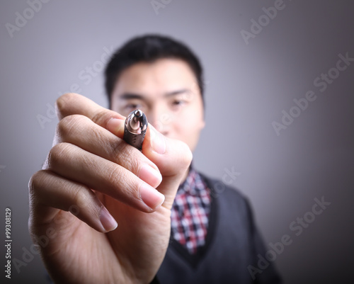 Man writing on the screen