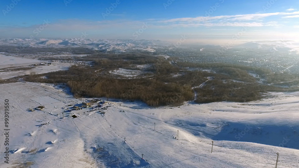Aerial shot of ski resort, mountains, and town. Aerial shot of ski resort, mountains, and town.