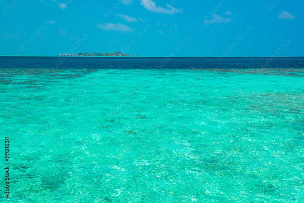 Sand beach and ocean wave, South Male Atoll. Maldives 