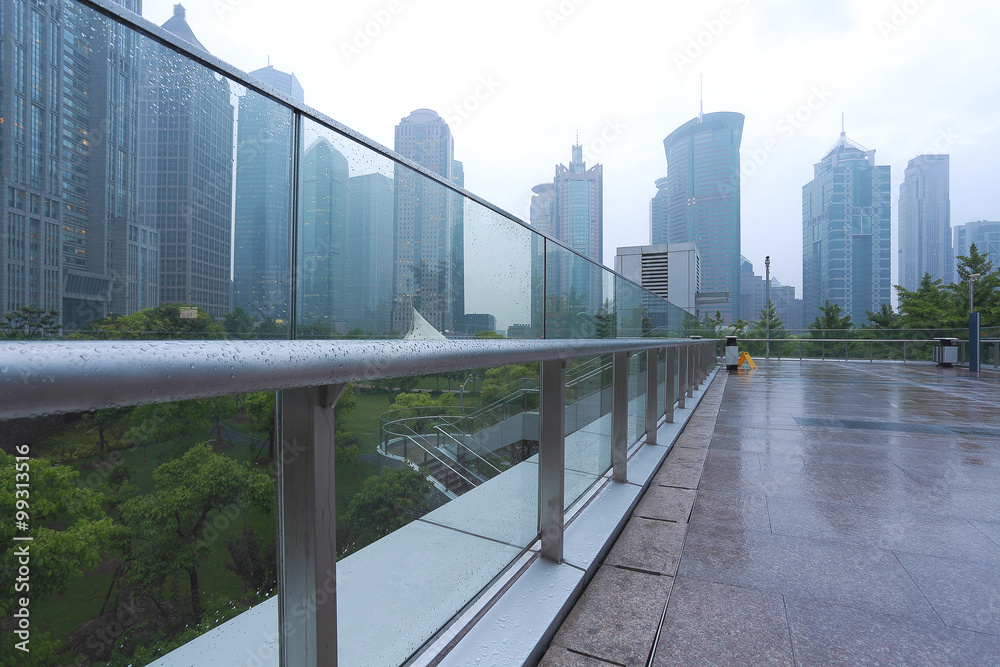 Empty marble floor road with modern city architecture background