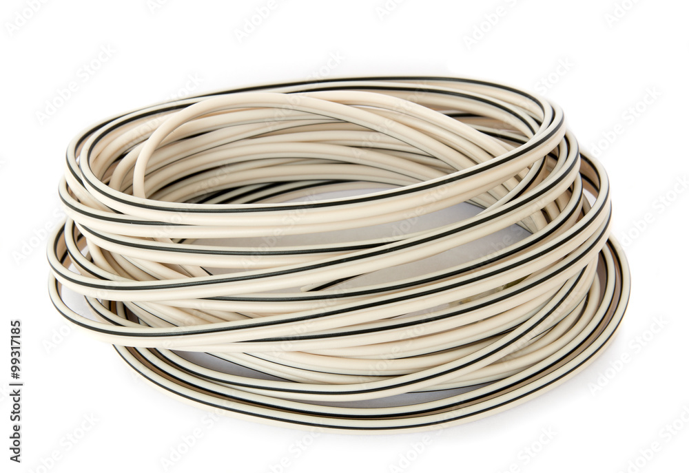 Skein of copper wire in insulation isolated on white. Technology and industry concept. Skein of copper wire in insulation isolated on white. Technology and industry concept.