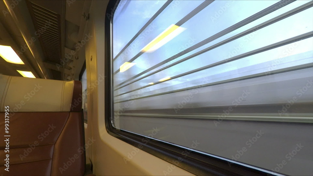 Window view from fast train travelling in the Netherlands