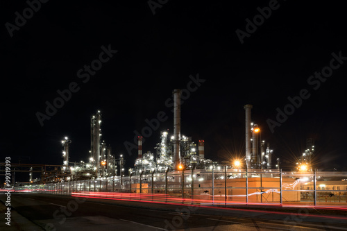Oil refinery plant of petroleum or petrochemical industry production at night