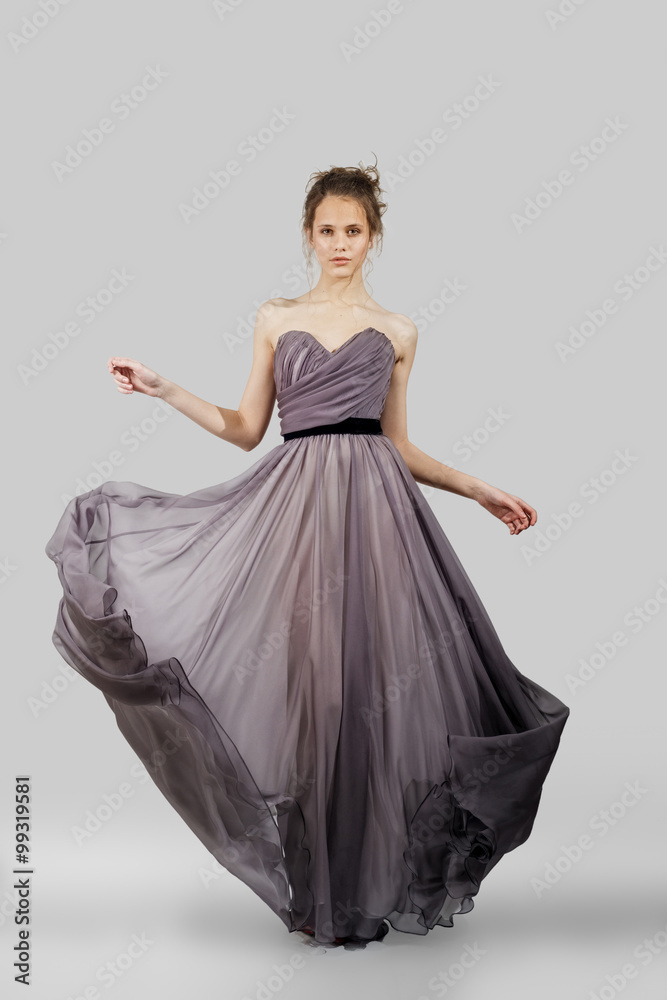 Fototapeta premium young lady posing in fashion dress