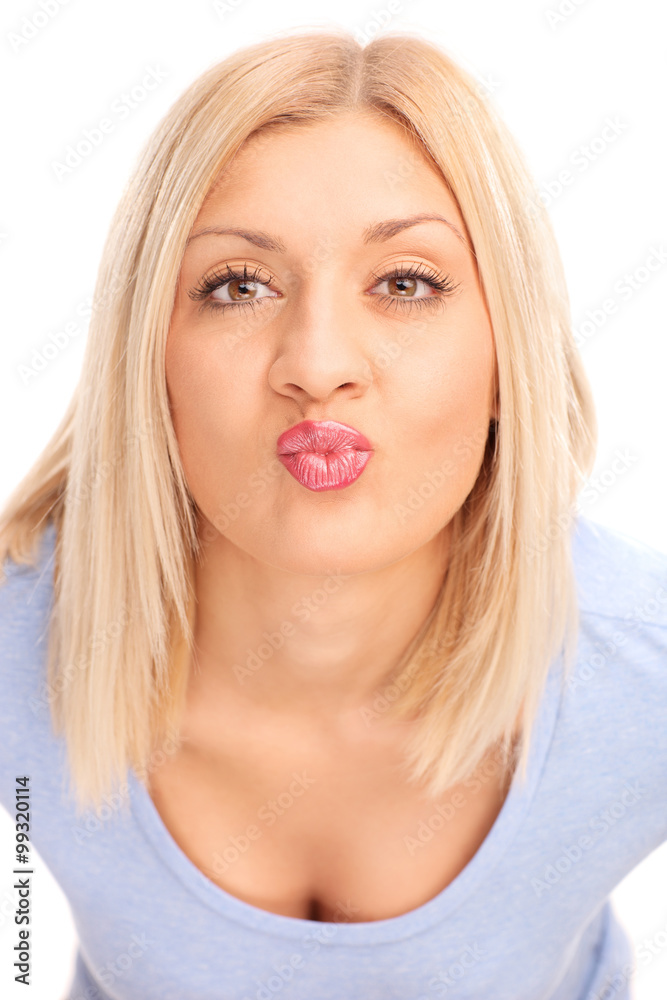 Girl going for a kiss towards the camera Girl going for a kiss towards the camera
