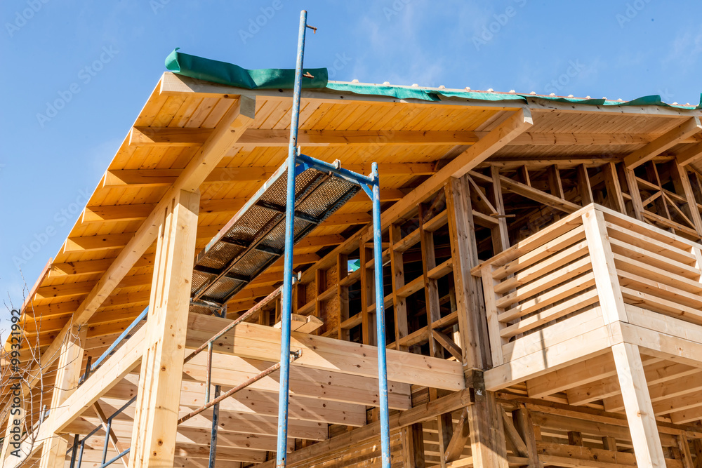 Wooden frame of a new house under construction Wooden frame of a new house under construction