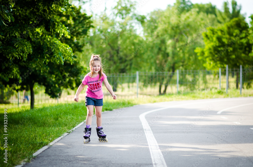 Girl roller-skating in the park