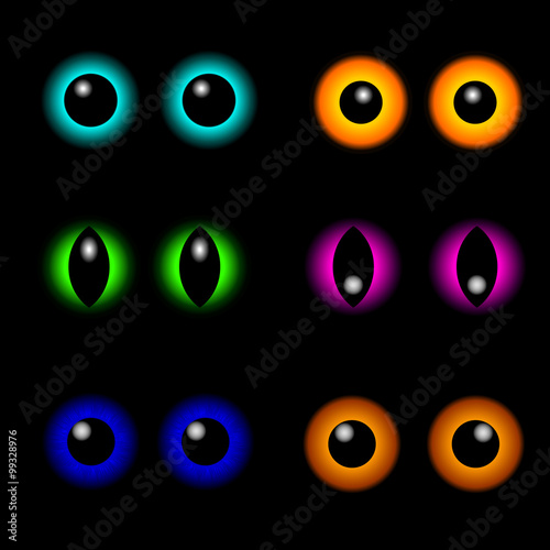 vector colored eyes on black background
